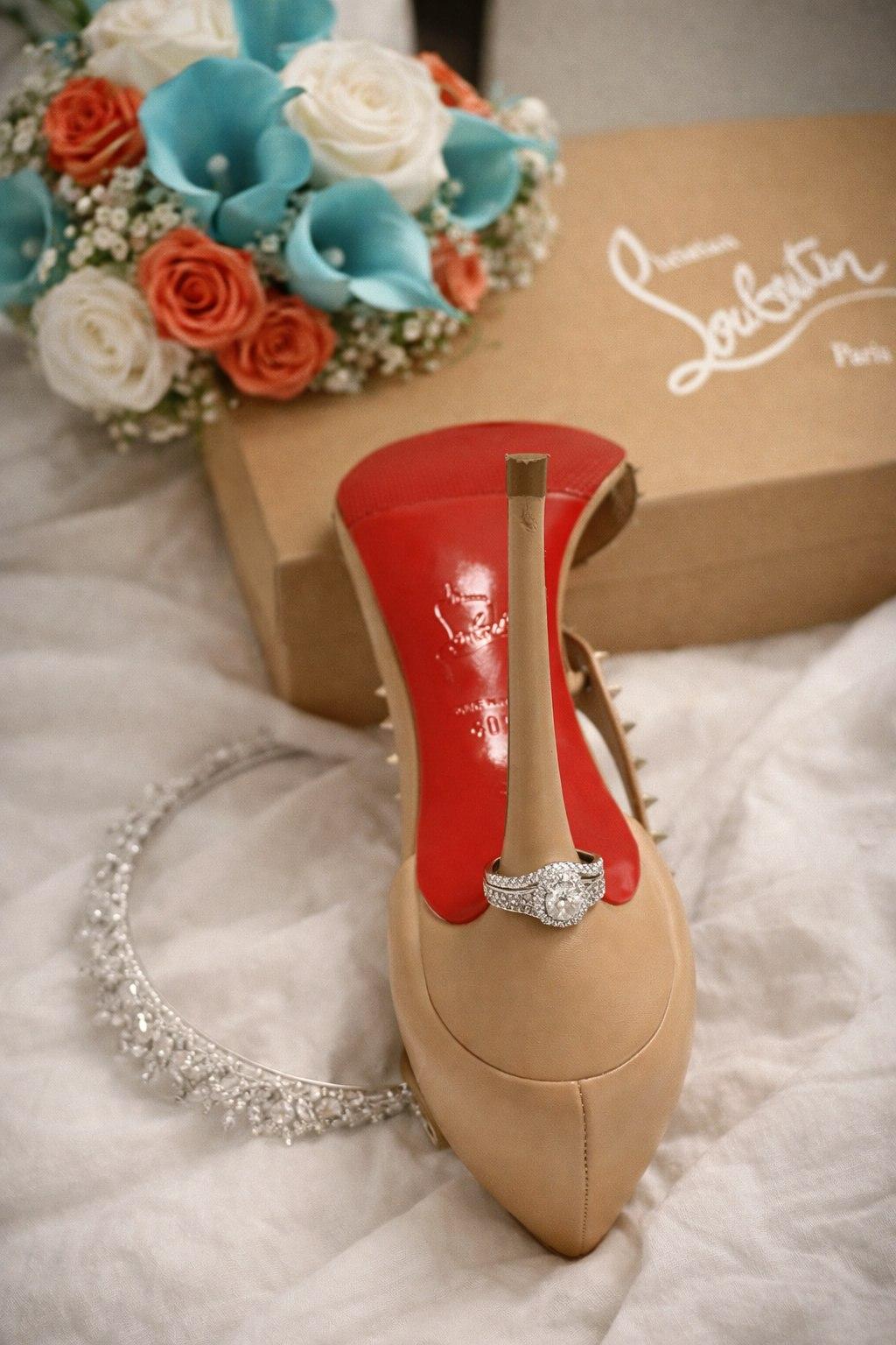 Bridal shoe and engagement ring detail styled with the bouquet